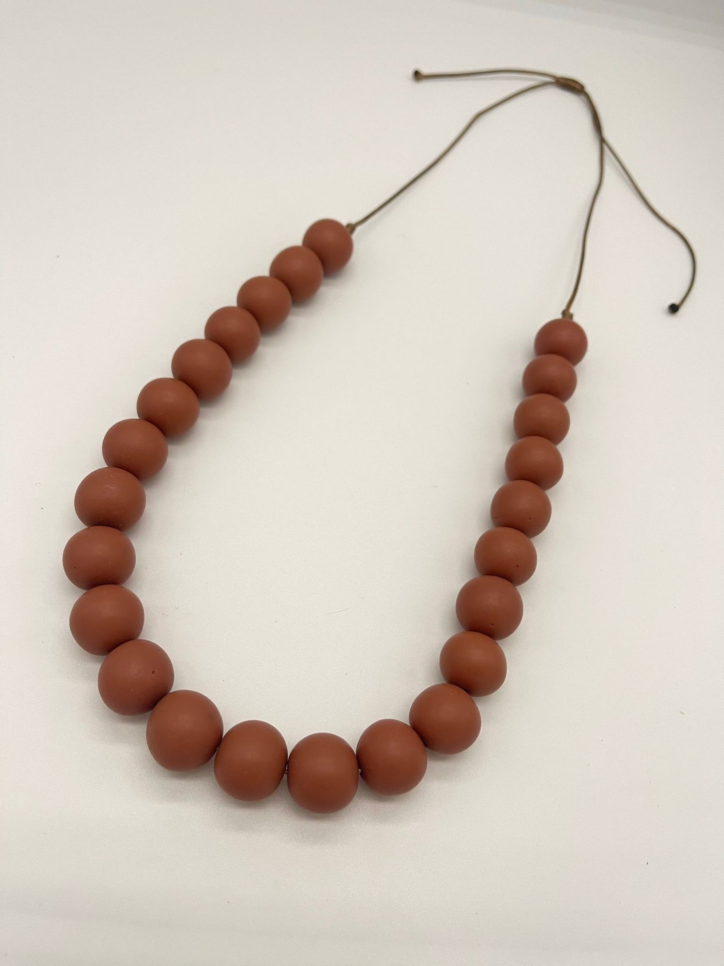 Deep nude necklace